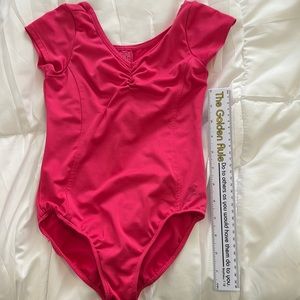 Pink gymnastics or ballet’s leotard for 5/6 gilrs